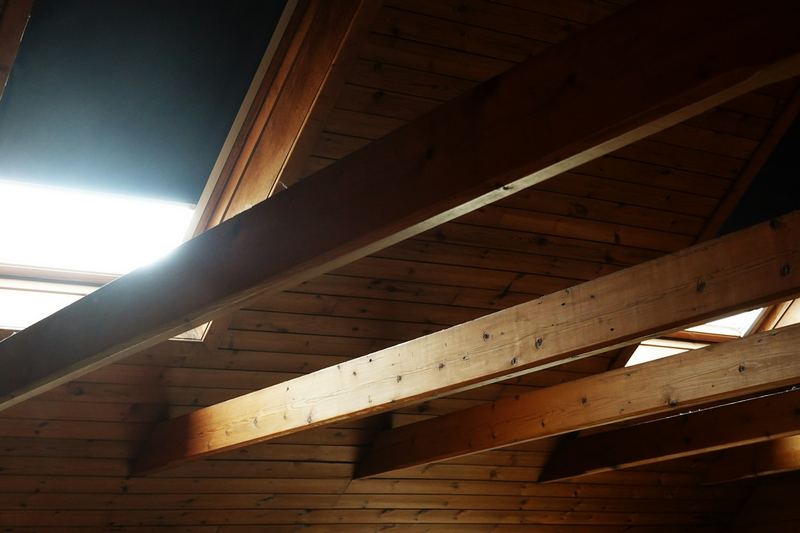 Timber roof framing and beams inside a roof space